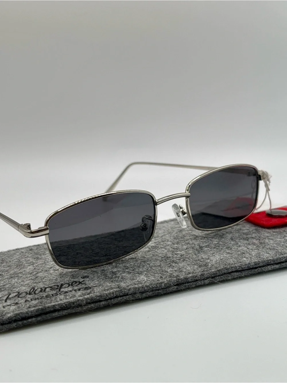 Vintage 90s Y2K Slim Rectangular Silver Metal Frame Sunglasses Dark Gray Lens
